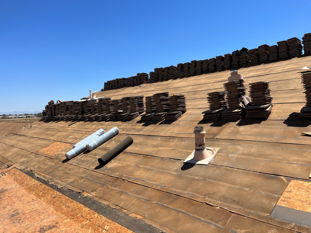A roof with tiles removed